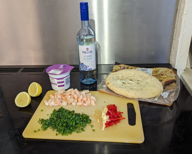 Sisyphus' Kitchen: Prawn and Chive Linguine ingredients laid out on a chopping board.